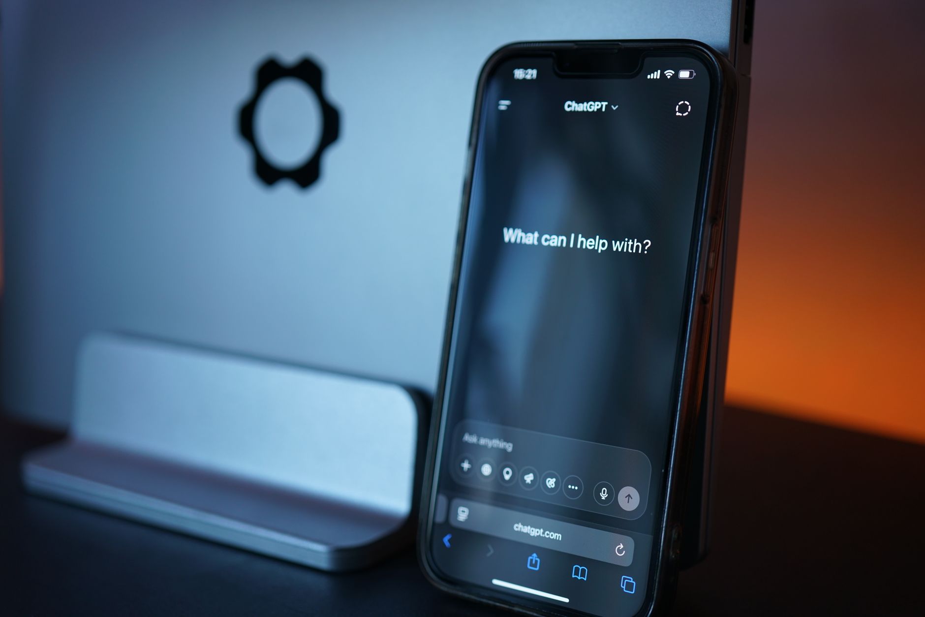 A smartphone showing an AI chat interface, the multi-model chat workspace Magai sells